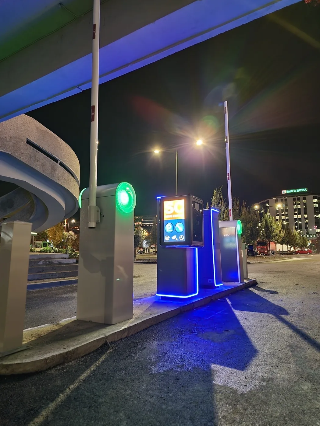 Parking entry column with LED base, night