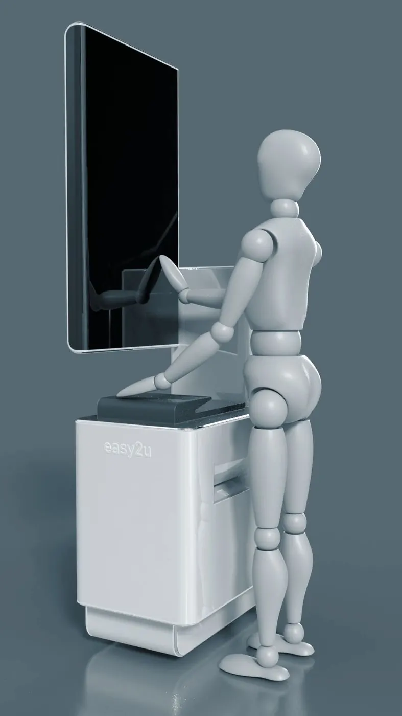 A full-size figure checking reach on a kiosk mock-up